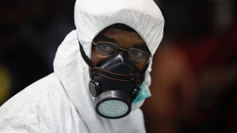 PHOTO: A Nigerian port health official wears protective gear at the arrivals hall of Murtala Muhammed International Airport in Lagos, Nigeria, Aug. 6, 2014.