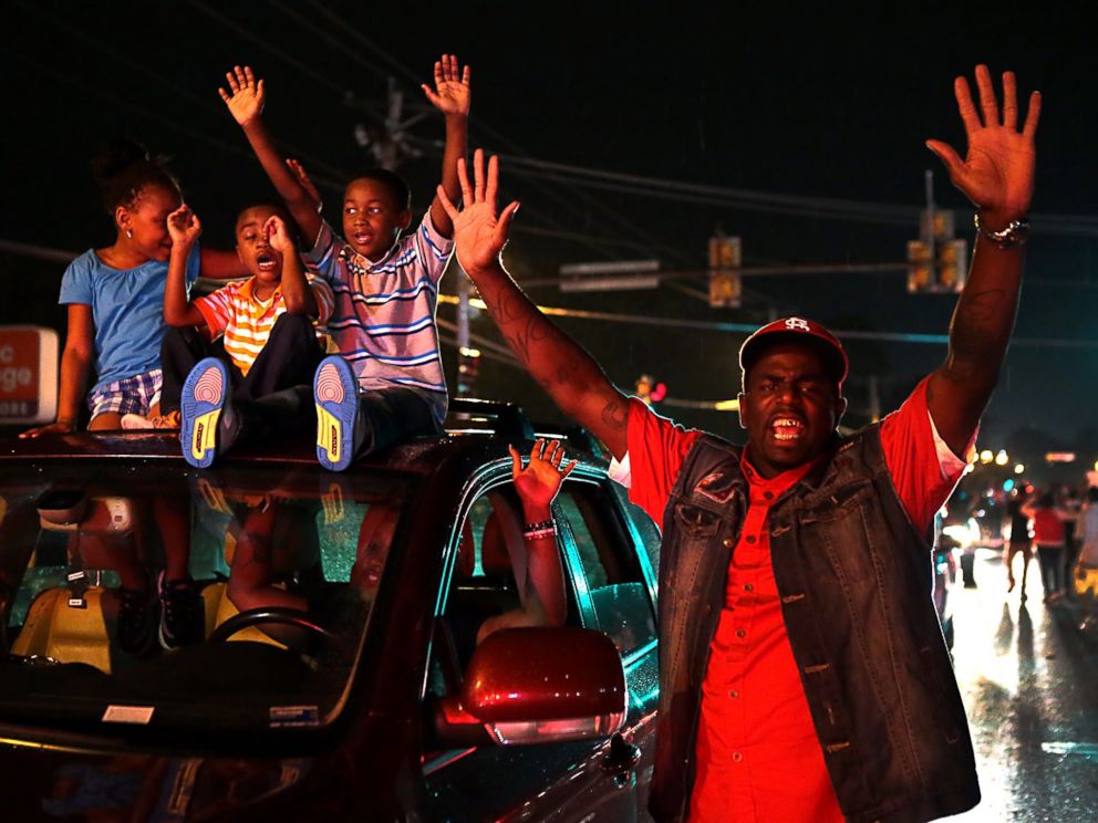 PHOTO: A sea of cars continued to roll down West Florissant Avenue in Ferguson as families protesting the killing of Michael Brown were plentiful on Friday, Aug. 15, 2014.