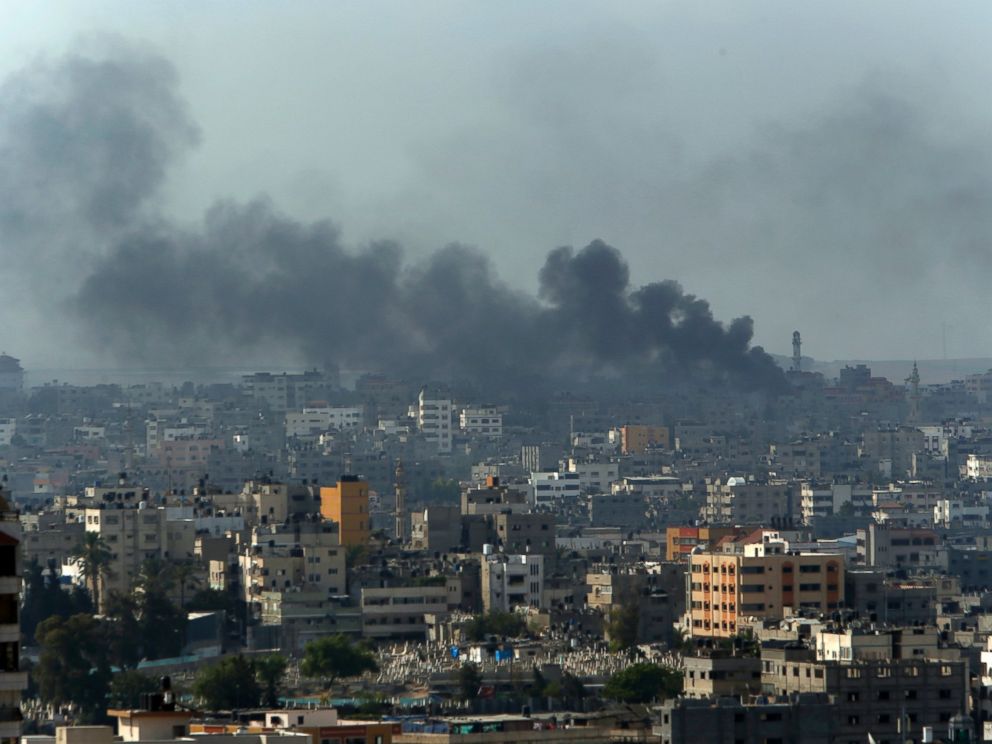 PHOTO: Smoke from Israeli strikes rise over Gaza City, northern Gaza Strip, July 21, 2014.