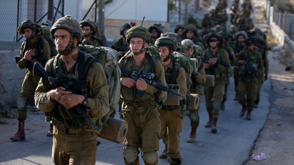PHOTO: Israeli soldiers search for three missing teenagers during a military operation in the West Bank city of Hebron, June 17, 2014.