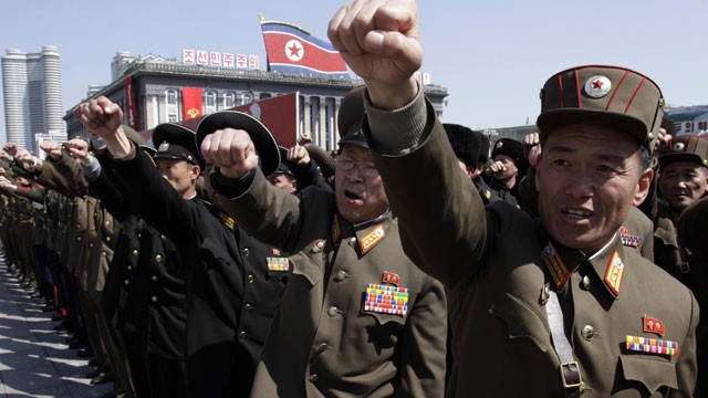 PHOTO: North Korean army officers punch the air as they chant slogans during a rally at Kim Il Sung Square in downtown Pyongyang, North Korea, Friday, March 29, 2013.