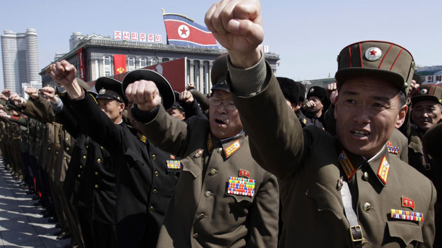 PHOTO: North Korean army officers punch the air as they chant slogans during a rally at Kim Il Sung Square in downtown Pyongyang, North Korea, Friday, March 29, 2013.