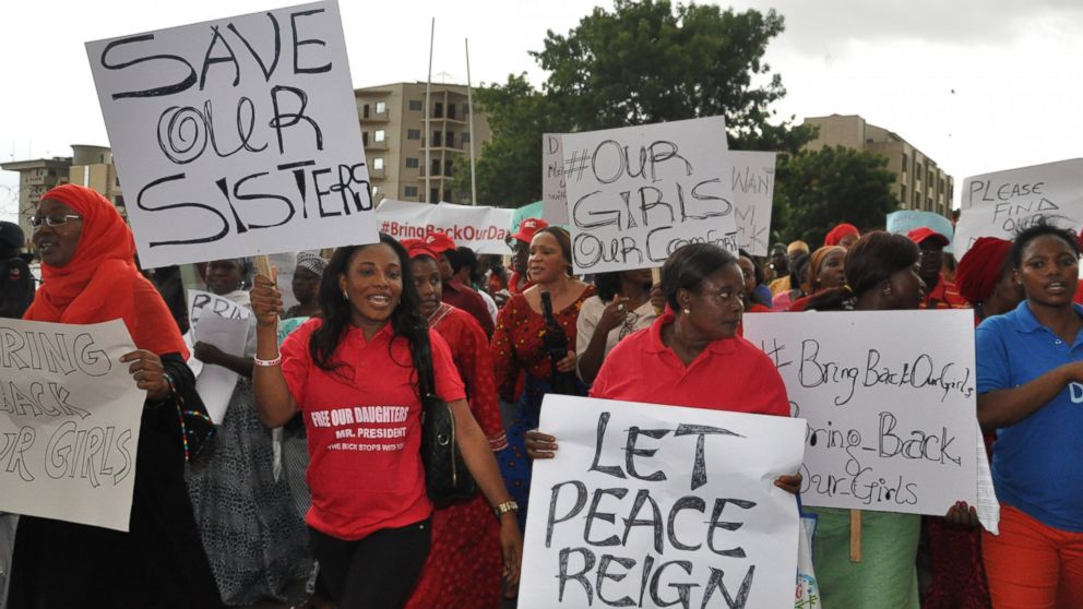 PHOTO: Women attend a demonstration calling on the government to rescue kidnapped schoolgirls of a government secondary school Chibok, in Abuja, Nigeria. Wednesday, April 30, 2014.