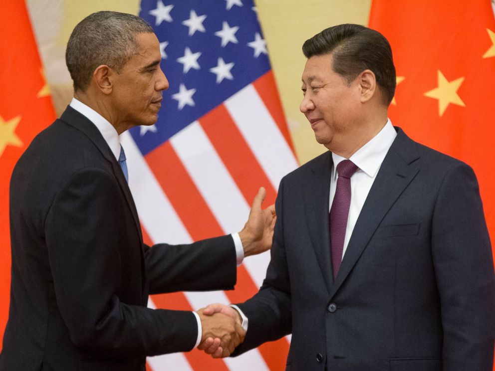 U.S. President Barack Obama, left, and Chinese President Xi Jinping shake hands following the conclusion of their joint news conference at the Great Hall of the People in Beijing, Nov. 12, 2014.