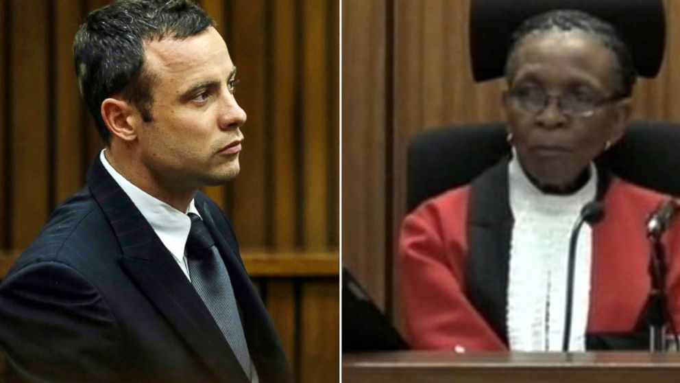 PHOTO: Oscar Pistorius, left and Judge Thokozile Masipais, right are seen in court during the murder trial of Reeva Steenkamp, in Pretoria, South Africa, March 11, 2014.