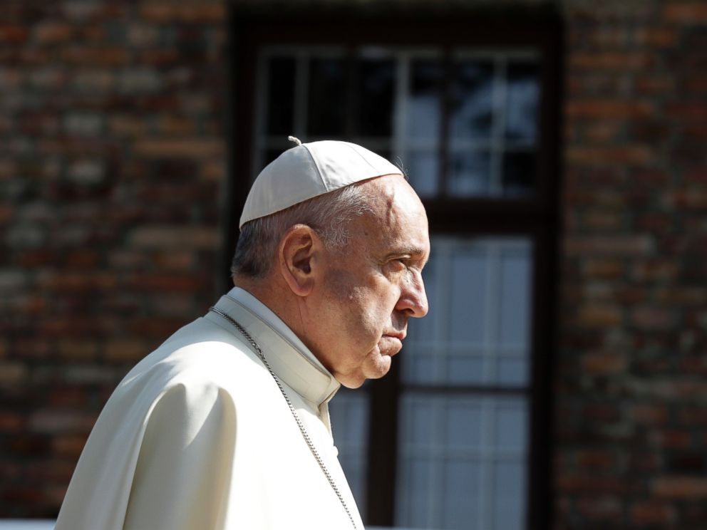PHOTO: Pope Francis walks through the gate of the former Nazi German death camp of Auschwitz in Oswiecim, Poland, July 29, 2016.