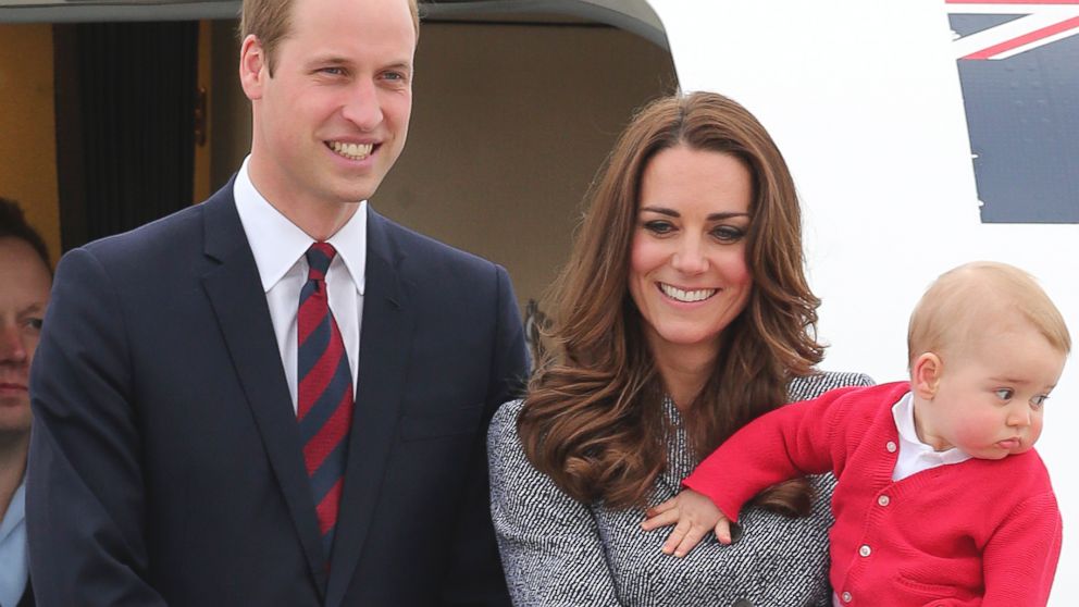 PHOTO: Britains Prince William, left, and Kate, the Duchess of Cambridge, center, along with son Prince George, stand atop of the stairs to say goodbye as they board their flight in Canberra, Australia, April 25, 2014.