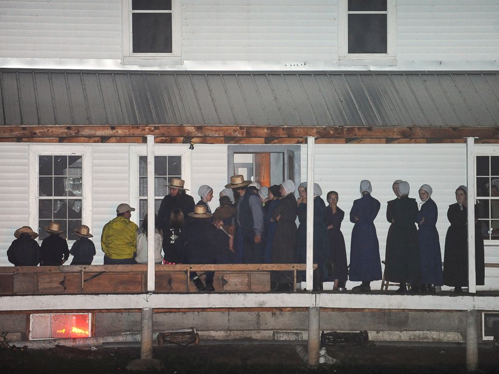 PHOTO: Supporters gather on the porch of a house at the intersection of Route 812 and Mt. Alone Road