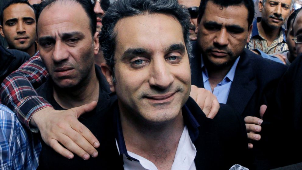PHOTO: Popular Egyptian television satirist Bassem Youssef enters Egypts state prosecutors office to face accusations of insulting Islam and the countrys Islamist leader in Cairo, Egypt, March 31, 2013.