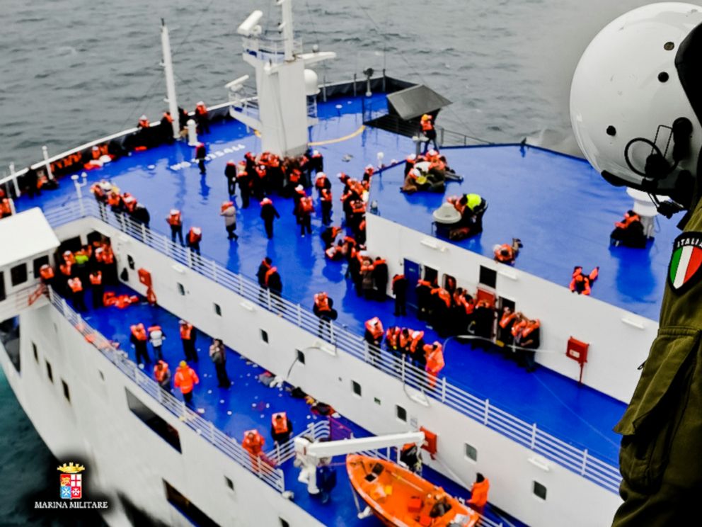 PHOTO: In this image released by the Italian Navy, passengers and crew are seen on the deck of the Italian-flagged ferry Norman Atlantic as it is approached by a rescue helicopter after it caught fire in the Adriatic Sea, Dec. 28, 2014. 