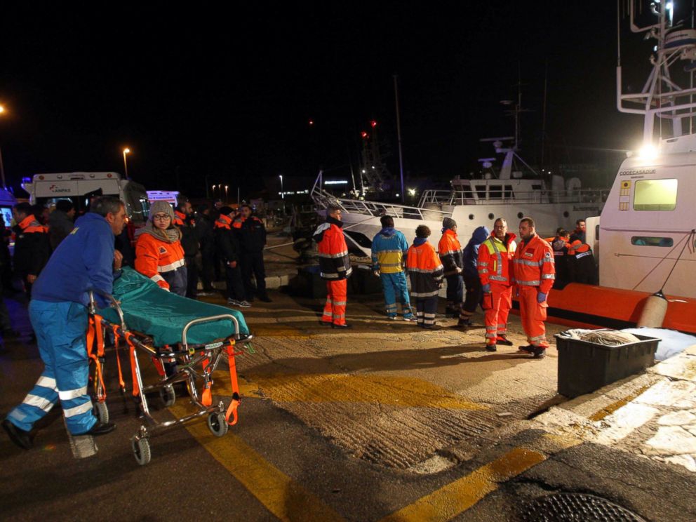 PHOTO: Paramedics wait for rescued passengers of the ferry that caught fire in the channel between Italy and Albania, at the Otranto harbor, near Lecce, southern Italy, Dec. 28, 2014.