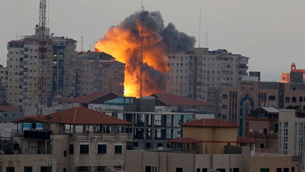 PHOTO: A ball of fire rises from an explosion on al-Zafer apartment tower following an Israeli air strike in Gaza City, in the northern Gaza Strip, Aug. 23, 2014.