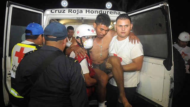 PHOTO: An injured inmate is carried as he arrives at the hospital after a fire broke out at the prison in Comayagua, Honduras, a town 90 miles north of the Central American countrys capital, Tegucigalpa, Feb. 15, 2012.