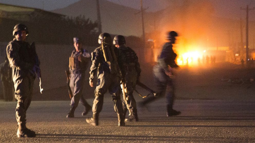 PHOTO: Afghan police arrive to secure the area after a car bomb detonated outside an ISAF civilian personnel compound in Kabul, Afghanistan, Oct 18, 2013.