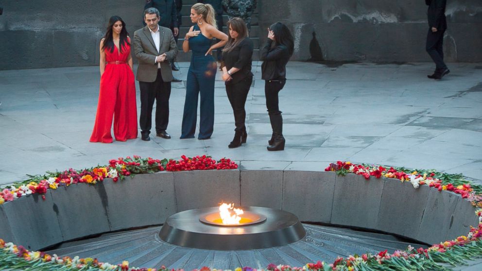 PHOTO: Kim Kardashian, left, and her sister Khloe Kardashian, center, visit the memorial to the victims of genocide in Yerevan, Armenia, April 10, 2015. 