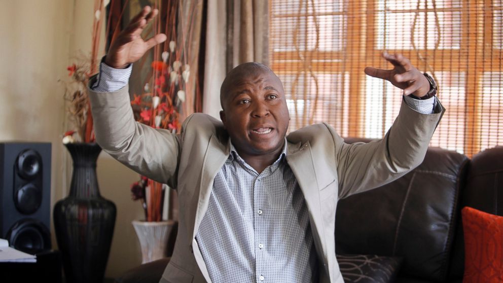 PHOTO: Thamsanqa Jantjie gesticulates at his home during an interview with the Associated Press in Johannesburg, Dec. 12, 2013.