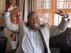 PHOTO: Thamsanqa Jantjie gesticulates at his home during an interview with the Associated Press in Johannesburg, Dec. 12, 2013.