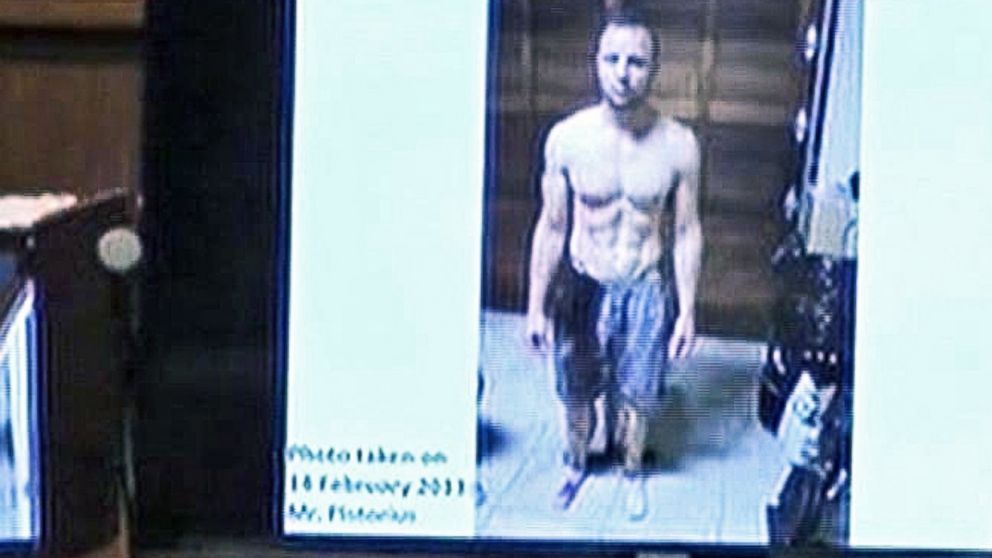 PHOTO: A police photograph of Oscar Pistorius standing on his blood-stained prosthetic legs was shown to the court at his murder trial in Pretoria, South Africa, March 14, 2014.