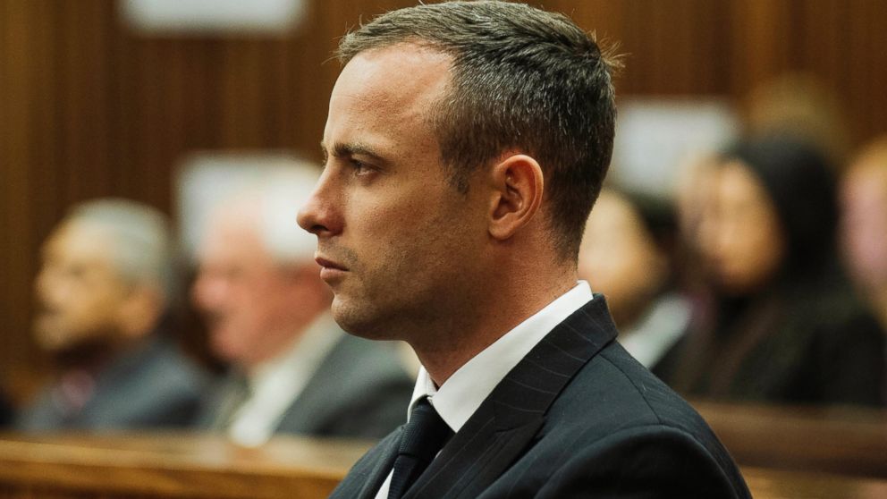 PHOTO: Oscar Pistorius listens to evidence being given in court, April 16, 2014, in Pretoria, South Africa.