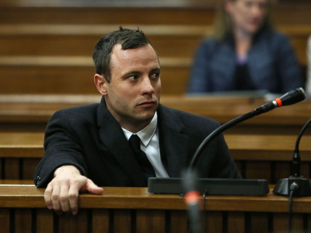 PHOTO: Oscar Pistorius attends court at his murder trial for the shooting death of his girlfriend Reeva Steenkamp on St. Valentines Day 2013 in Pretoria, South Africa, July 8, 2014.