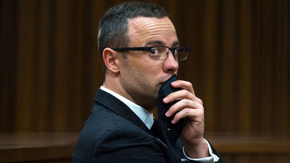 PHOTO: Oscar Pistorius, gestures, as he listens to psychiatric evidence for his defense, during his ongoing murder trial in Pretoria, South Africa, May 13, 2014.