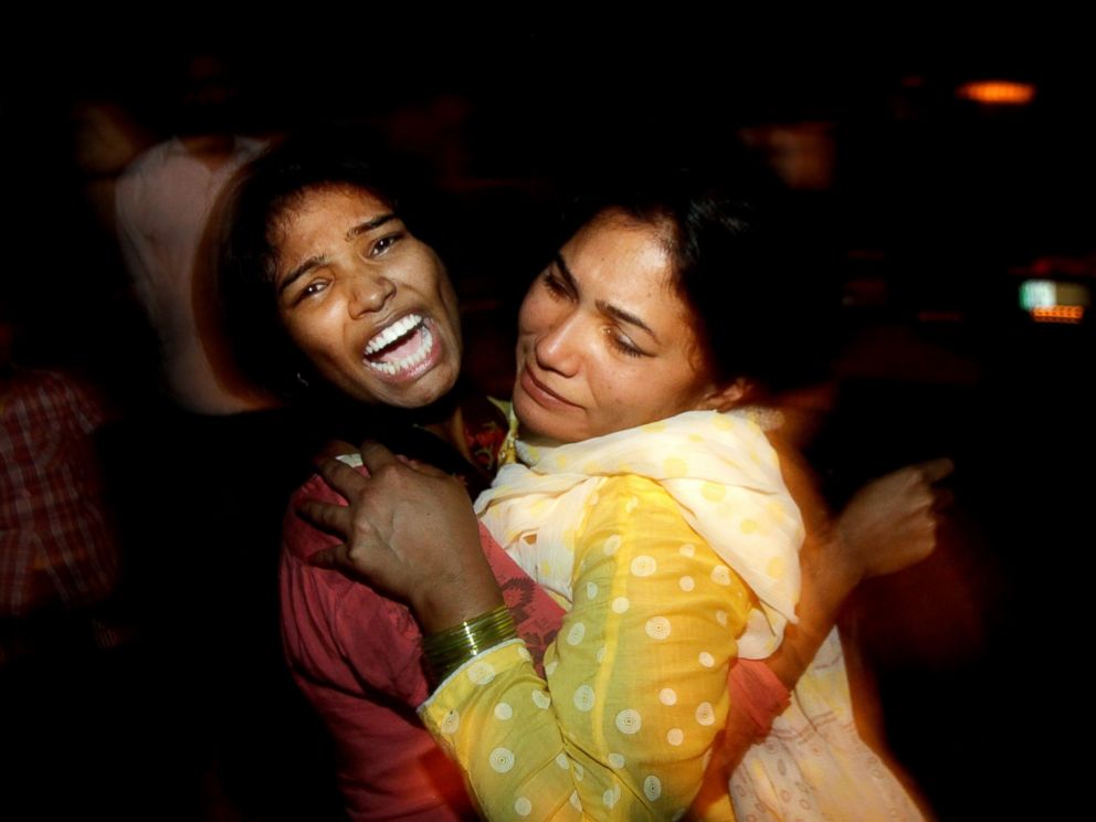 PHOTO: Women comfort each other as they mourn over the death of a family member who was killed in a bomb blast, at a local hospital in Lahore, Pakistan, March, 27, 2016.