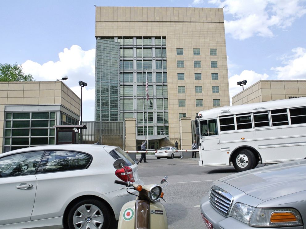 PHOTO: Cars and a bus pass the main building of the U.S. Embassy in downtown Moscow, Russia.