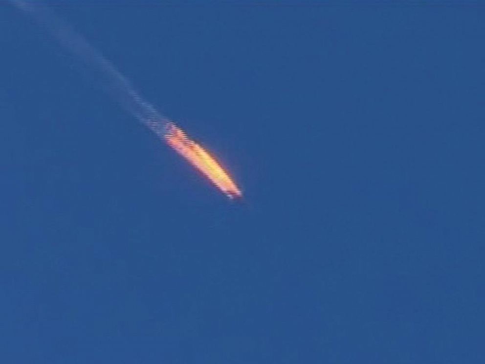 PHOTO:This video frame grab shows a Russian warplane on fire before crashing on a hill as seen from Hatay province, Turkey, Nov. 24, 2015.