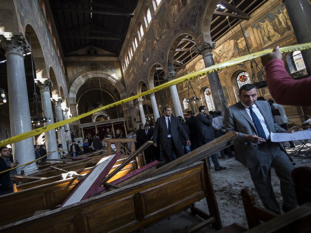 PHOTO: Egyptian security forces inspect the scene of a bomb explosion at the Saint Peter and Saint Paul Coptic Orthodox Church, Dec. 11, 2016, in Cairos Abbasiya neighborhood.