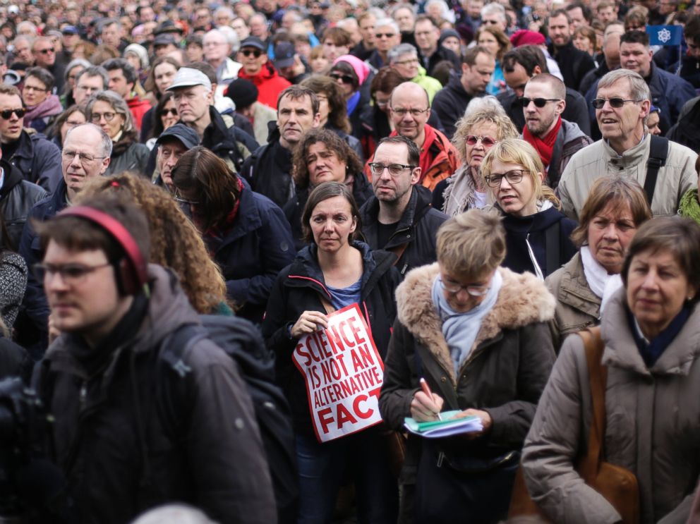 PHOTO: A woman with a poster attends with thousands of other demonstrators the March for Science in Berlin, April 22, 2017.