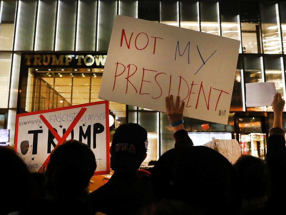 PHOTO: Dozens of anti-Donald Trump protesters stand along 5th Avenue in front of Trump Tower as New Yorkers react for a second night to the election of Trump as president of the United States, Nov. 10, 2016 in New York City.