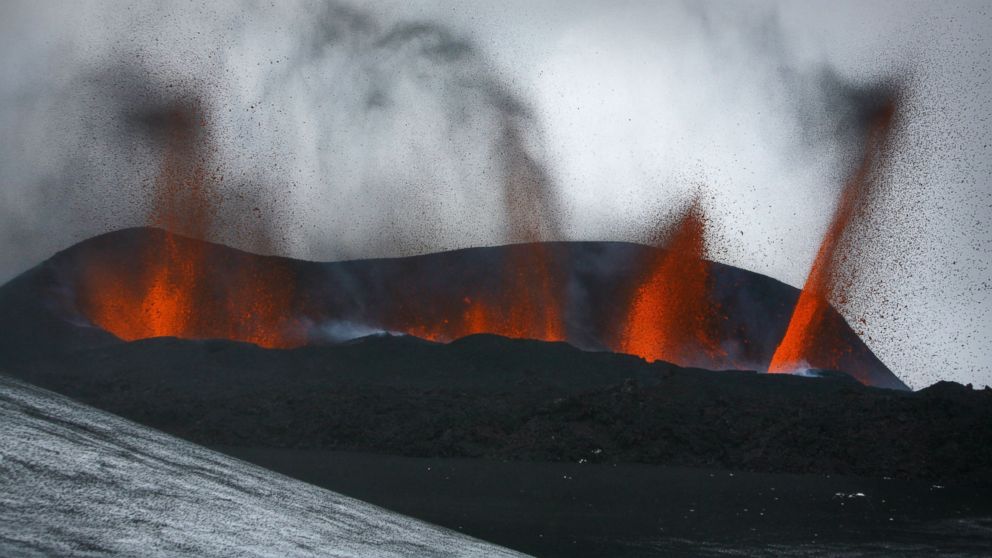 PHOTO: Lava spews out of a mountain in this file photo, March 21, 2010, in Hvolsvollur in the region of the Eyjafjallajokull glacier in Iceland. 