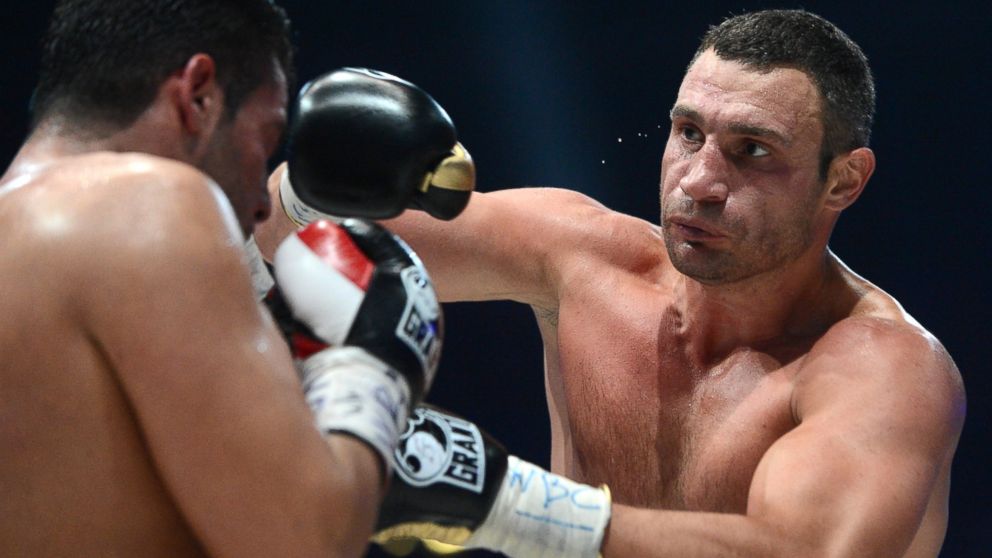 PHOTO: Ukraines two-time World Heavyweight champion Vitali Klitschko, right, fights Germanys Manuel Charr in Moscow, Sept. 9, 2012.