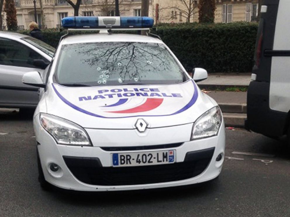 PHOTO: A police car riddled with bullets during an attack on the offices of the newspaper Charlie Hebdo in Paris, Jan. 7, 2015.