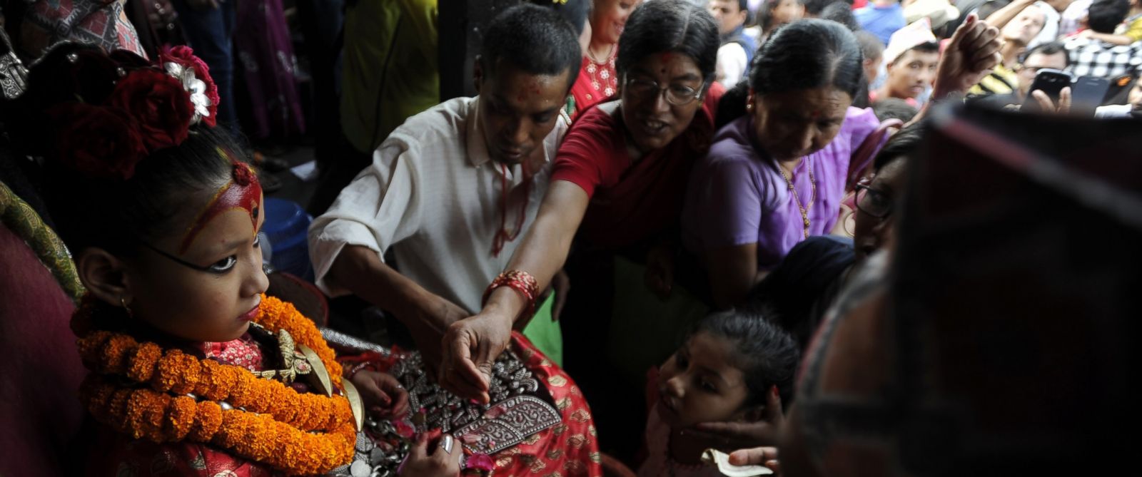 PHOTO: The Kumari, considered a living goddess, attends festivities on the last day of the Rato Machindranath chariot festival, also known as Bhoto Jatra, in Jwalakhel on the outskirts of Kathmandu, July 29, 2016.