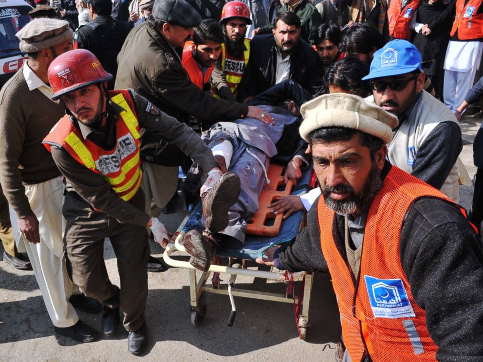 PHOTO: Pakistani rescuers shift an injured man to a hospital following an attack by gunmen in the Bacha Khan university in Charsadda, Peshawar, Jan. 20, 2016.