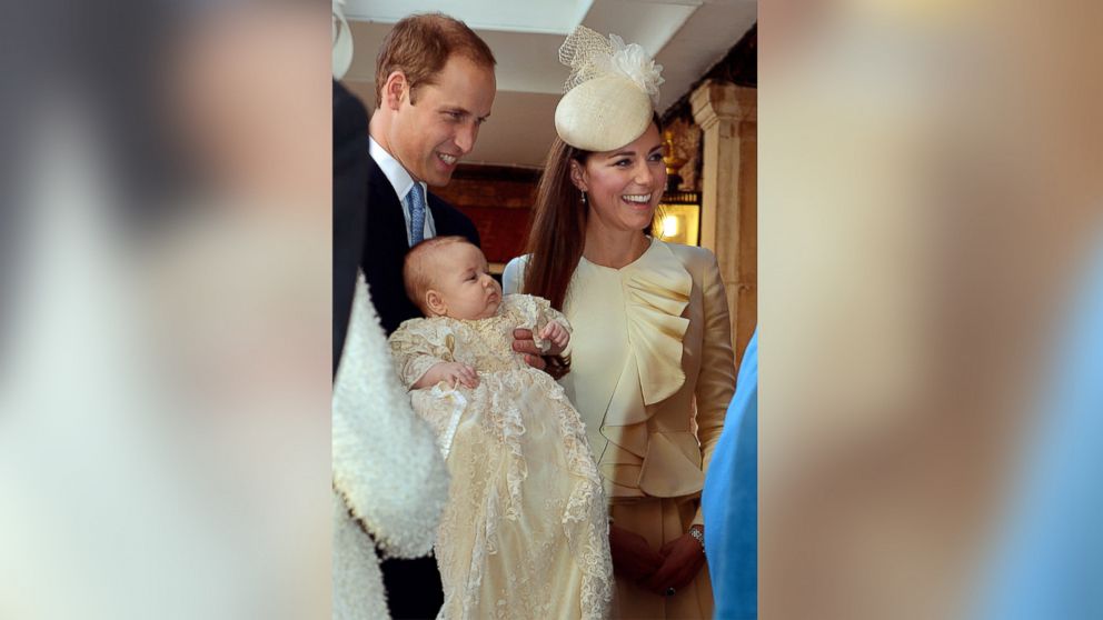 PHOTO: Britains Prince William, Duke of Cambridge and his wife Catherine, Duchess of Cambridge, arrive with their son Prince George of Cambridge at Chapel Royal in St Jamess Palace in central London, Oct. 23, 2013.