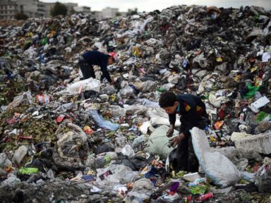Syrian Children Forage Through Trash to Survive
