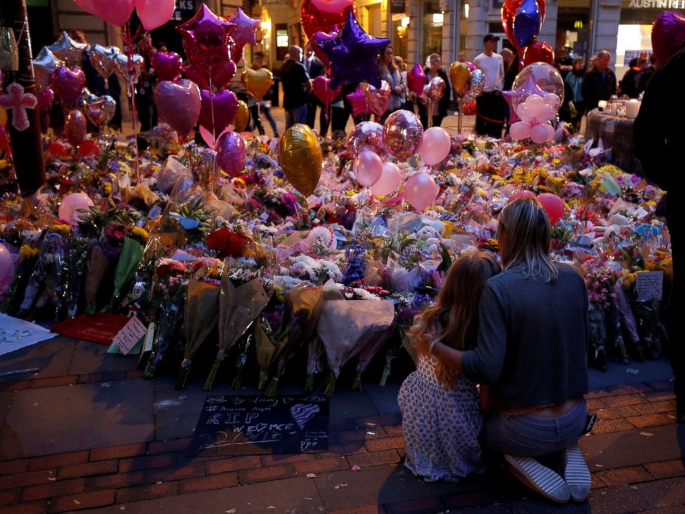 PHOTO: People attend a vigil for the victims of last weeks attack at a pop concert at Manchester Arena, in central Manchester, Britain May 29, 2017.