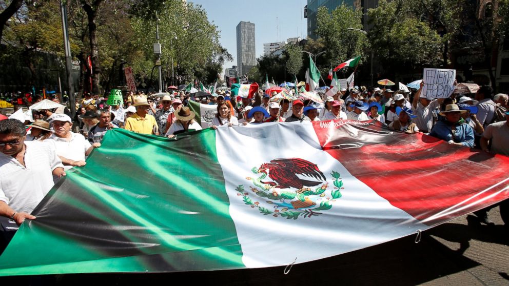 Thousands march in Mexico to demand respect, reject Trump