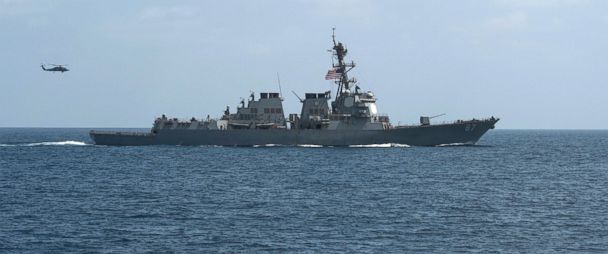 PHOTO: The guided-missile destroyer USS Mason conducts divisional tactic maneuvers as part of an exercise in the Gulf of Oman, September 10, 2016.