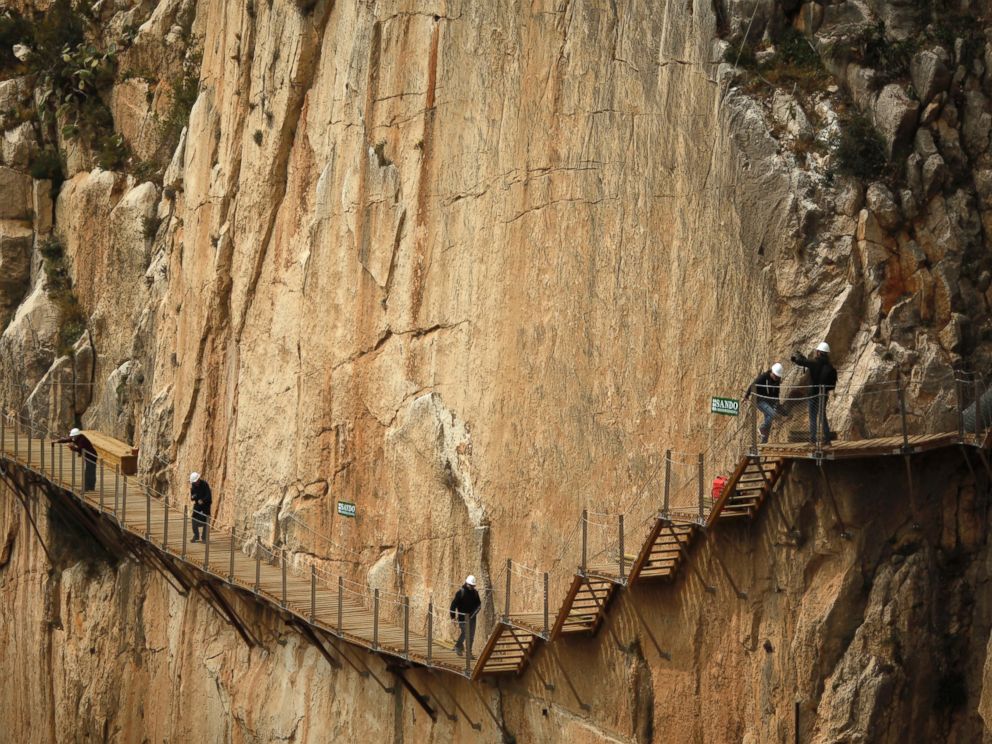 PHOTO: Journalists walk along the new Caminito del Rey (The Kings Little Pathway) in El Chorro-Alora, near Malaga, southern Spain March 15, 2015. 