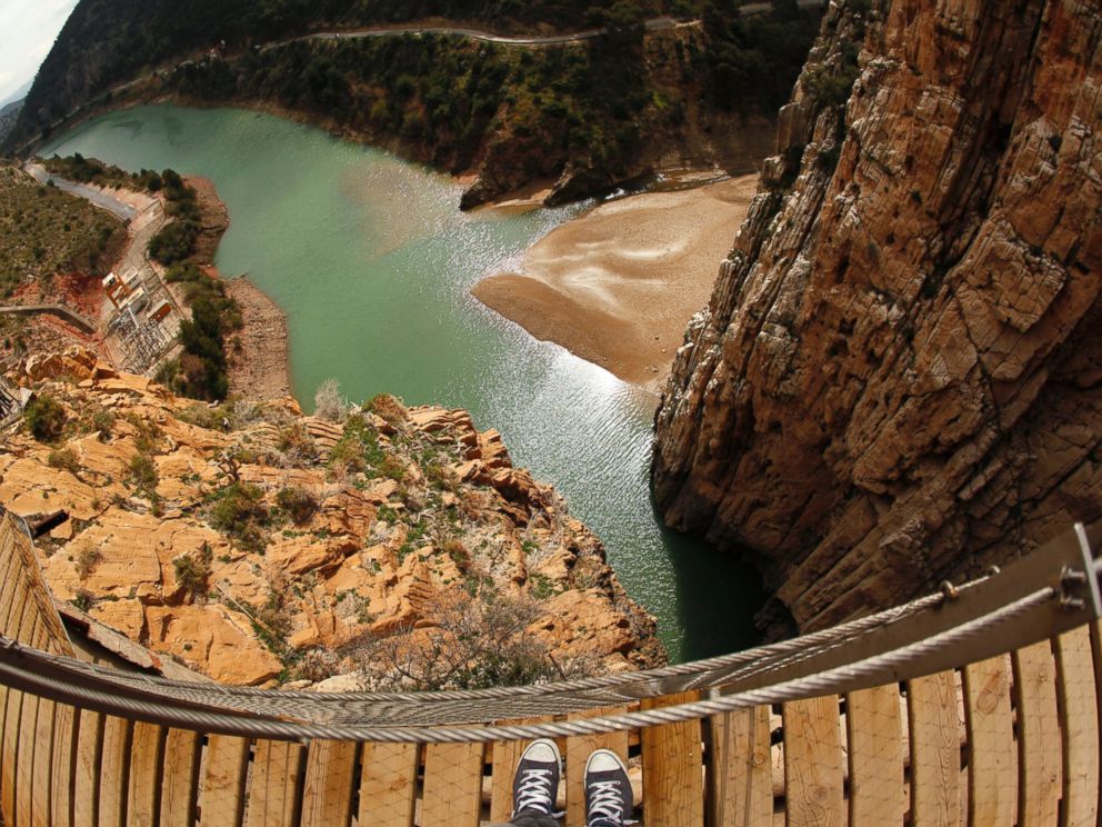 PHOTO: Journalists walk along the new Caminito del Rey (The Kings Little Pathway) in El Chorro-Alora, near Malaga, southern Spain March 15, 2015. 
