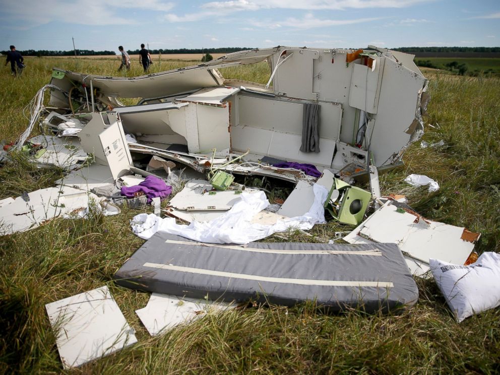 PHOTO: Parts of the wreckage are seen at a crash site of the Malaysia Airlines Flight MH17 near the village of Hrabove (Grabovo), Ukraine, July 21, 2014.