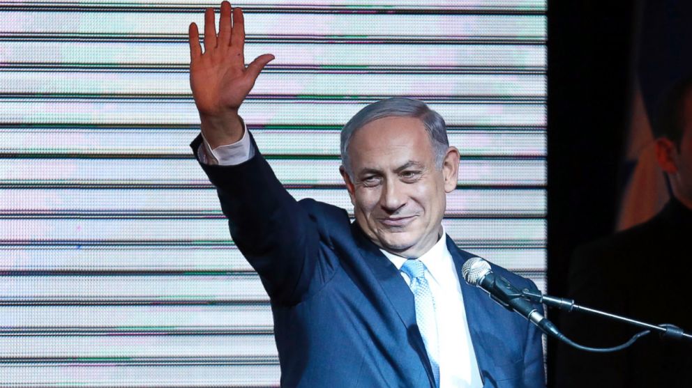 PHOTO: Israeli Prime Minister Benjamin Netanyahu gestures to supporters at party headquarters in Tel Aviv, March 18, 2015. 