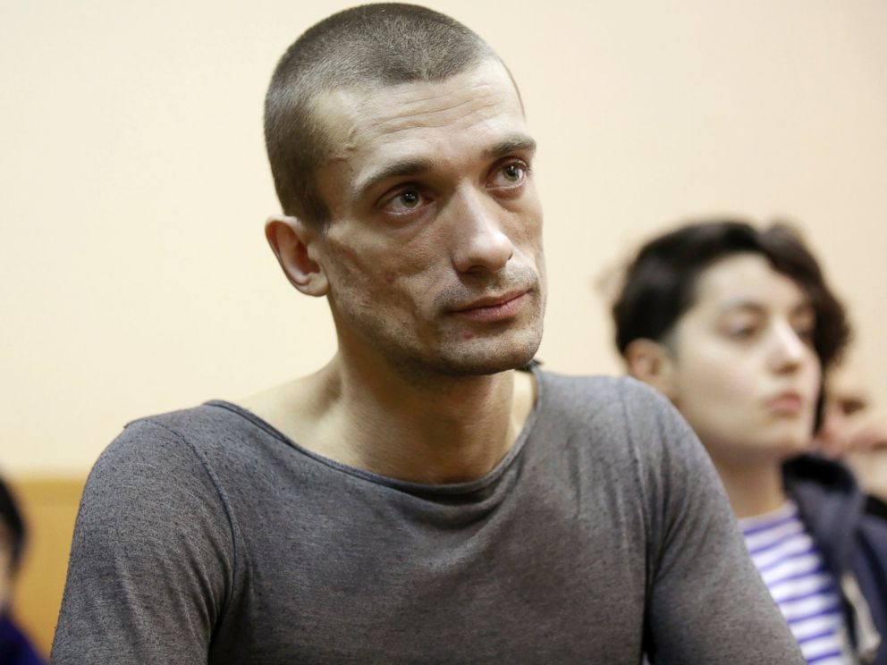 PHOTO: Artist Pyotr Pavlensky listens during a hearing at a Russian courthouse in St.Petersburg, Russia, Feb. 24, 2014.