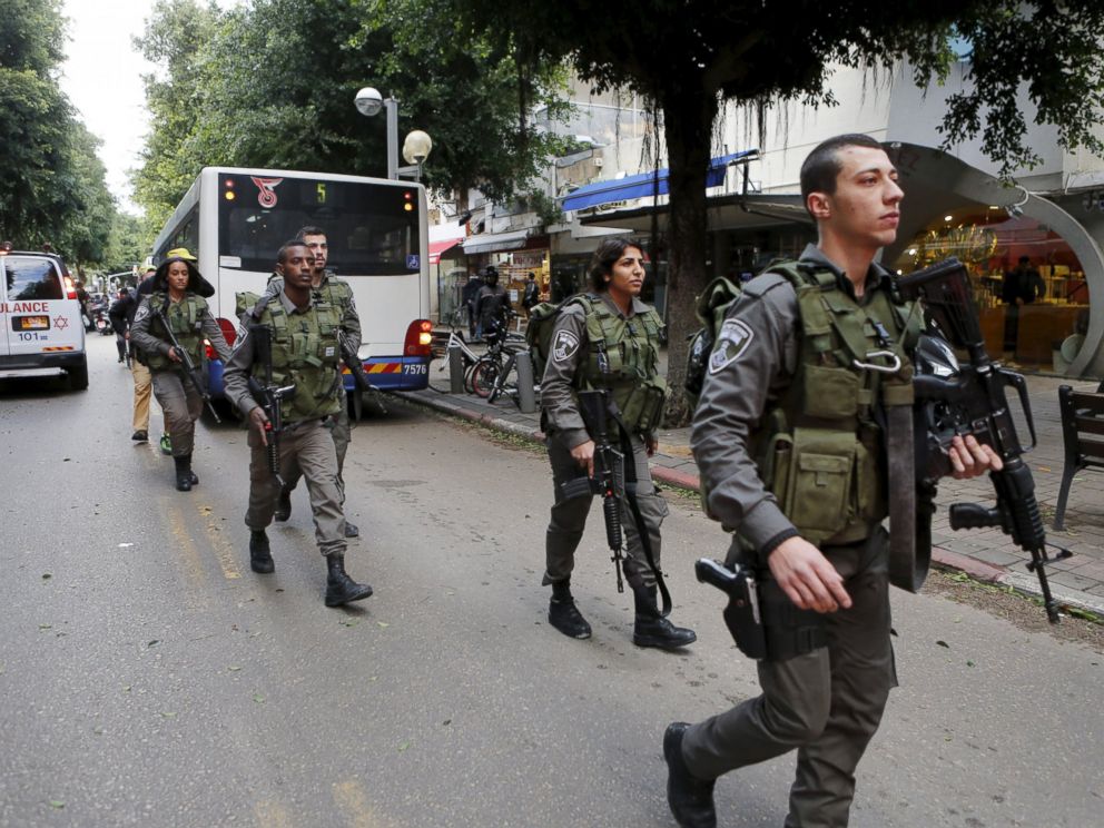 PHOTO: Israeli border police guards secure the scene of a shooting incident in Tel Aviv, Jan. 1, 2016.