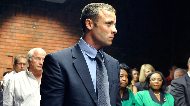 PHOTO: Olympian Oscar Pistorius stands following his bail hearing in Pretoria, South Africa, Feb. 19, 2013.