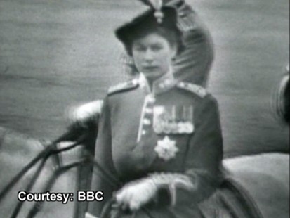VIDEO: Queen Elizabeth stands in for her father at a military parade.