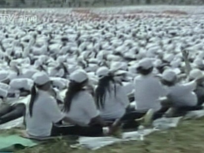 VIDEO: More than 10,000 people in China set a world record for human domino chain.